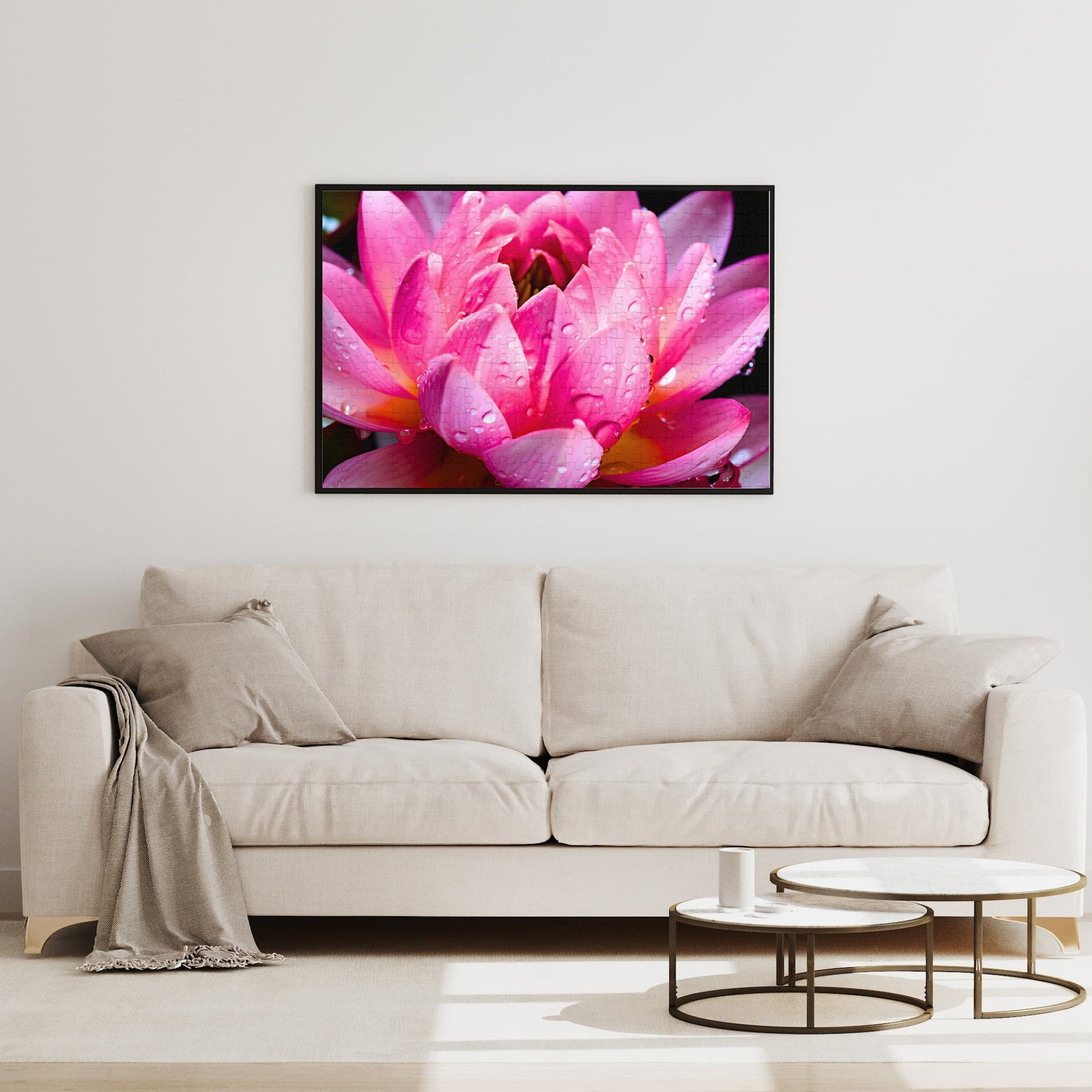 Fully assembled 500-piece Nelumbo Nucifera flower puzzle, beautifully framed and enhancing the aesthetic of a cozy living room wall.