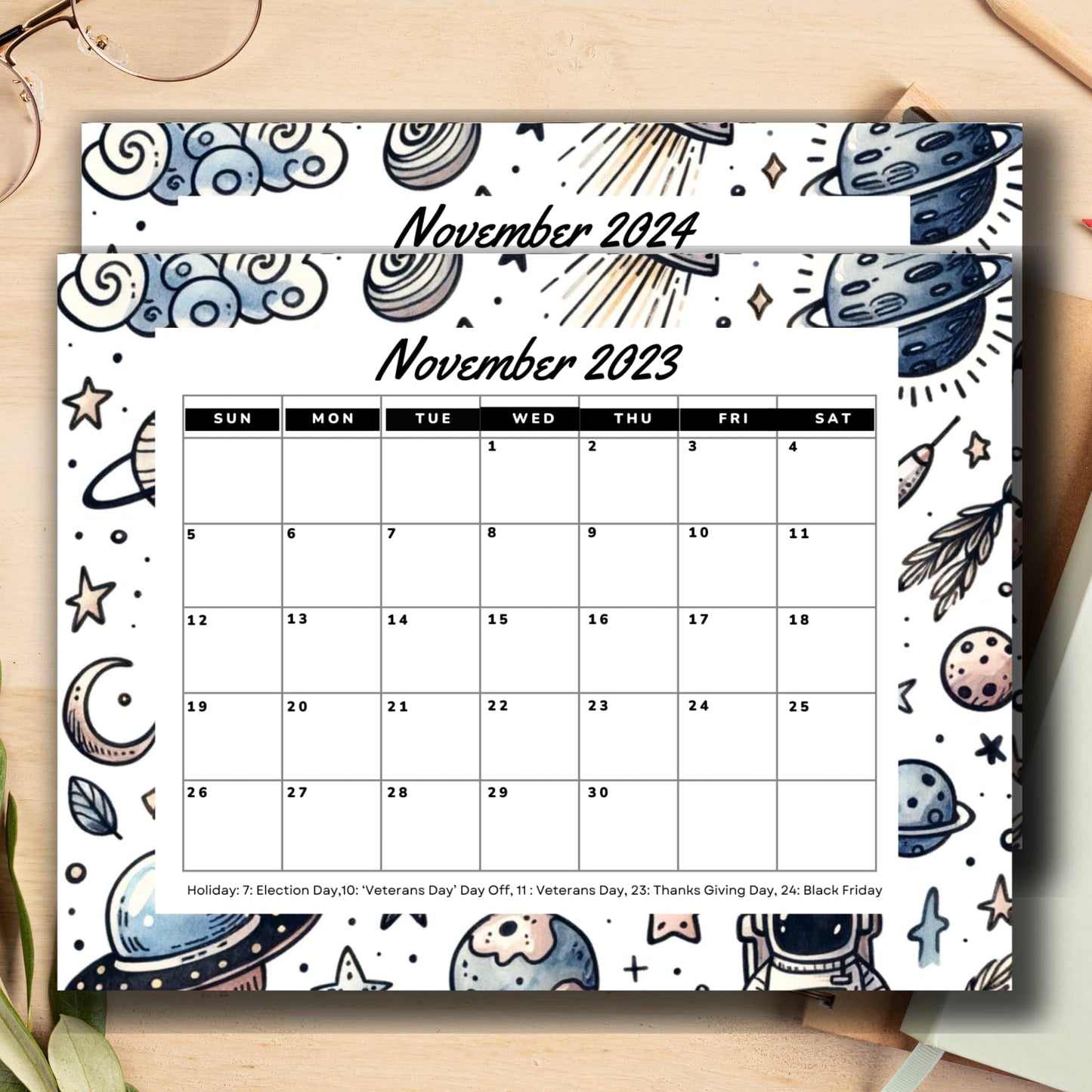 November 2023 & 2024 space-themed calendar alongside organized notebooks for planning and scheduling.