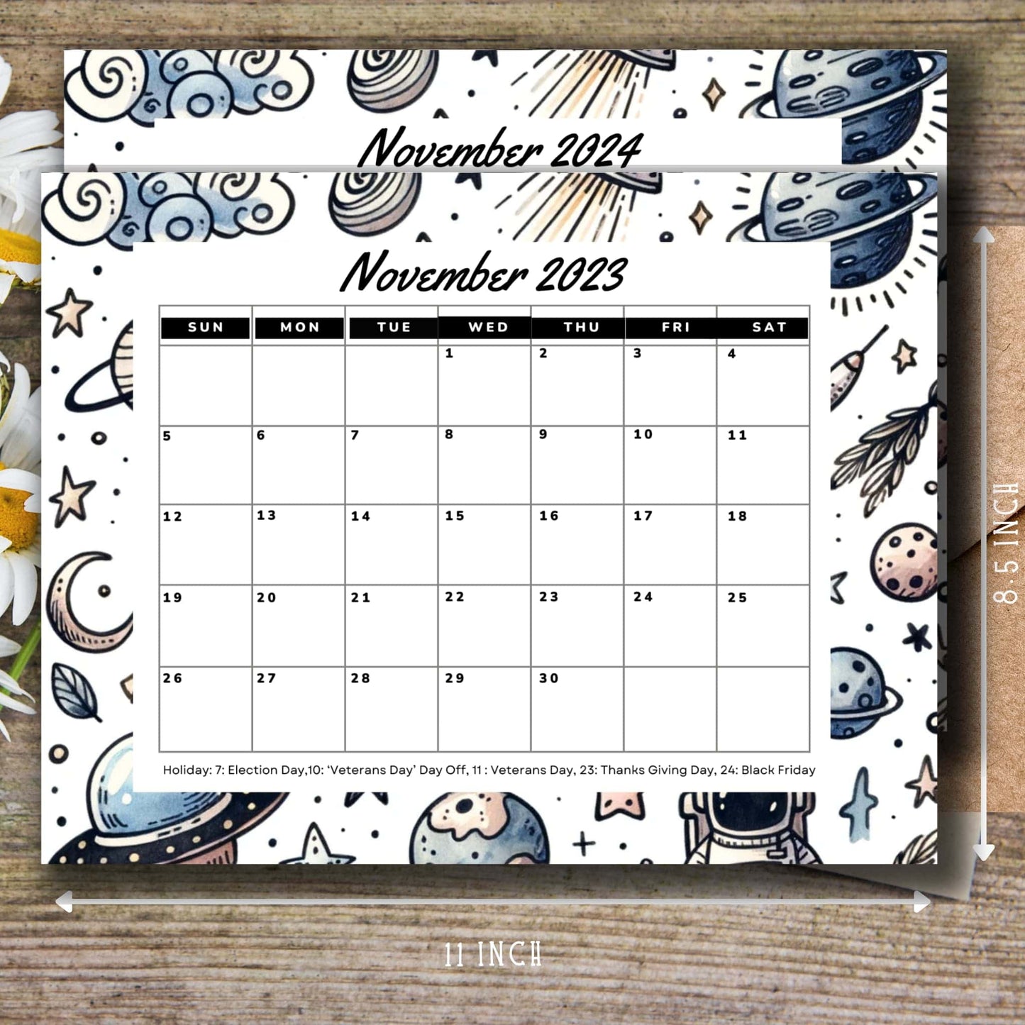 Space-themed November 2023 & 2024 calendar on a wooden table, with a clear size guide for reference.
