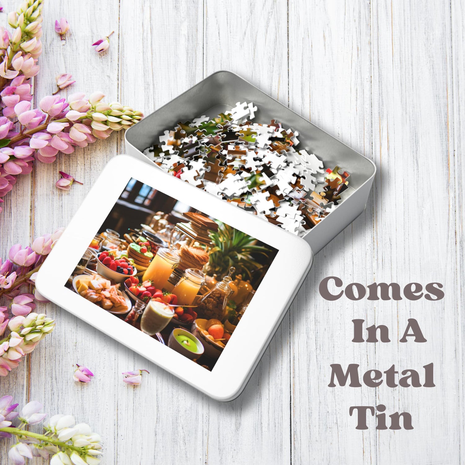 PUZZLE PIECES IN A METAL TIN BOX ON A WOODEN TABLE