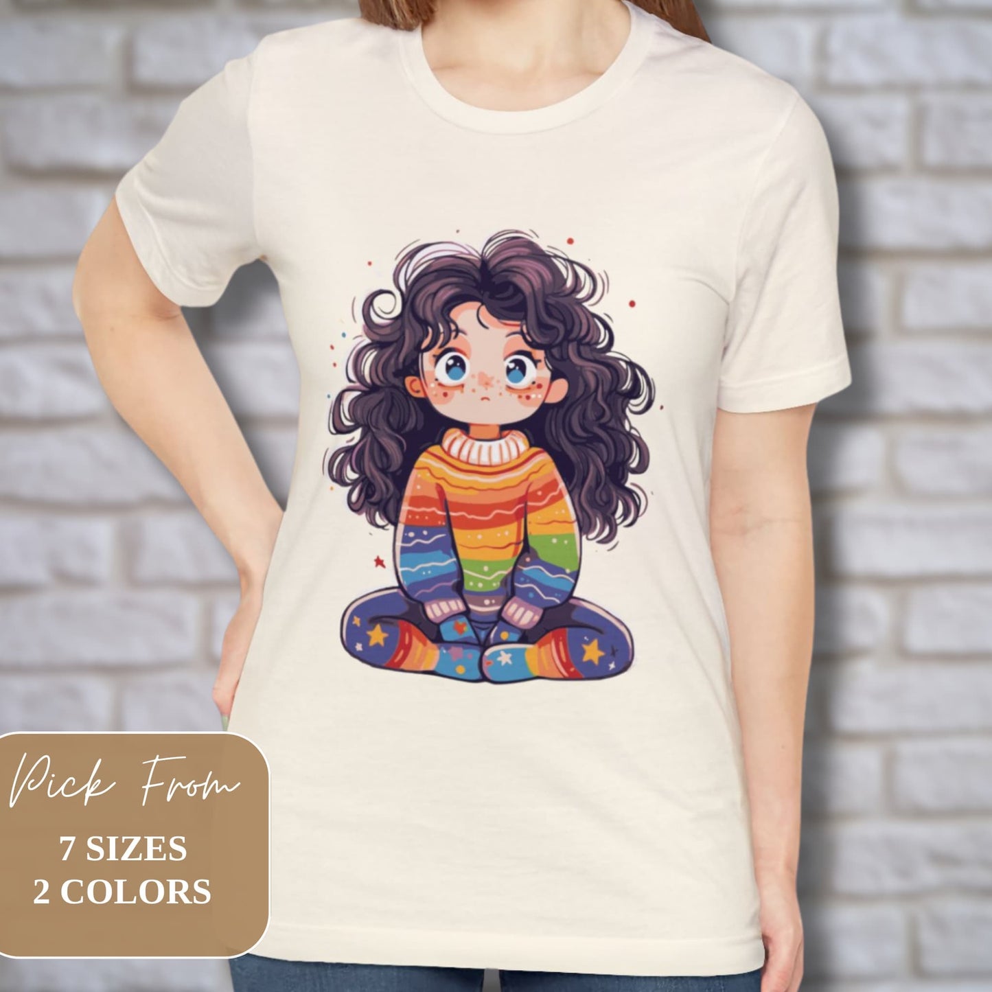 Fashion-forward moment with model against a wall background wearing the vibrant Y2K Rainbow Girl T-shirt.