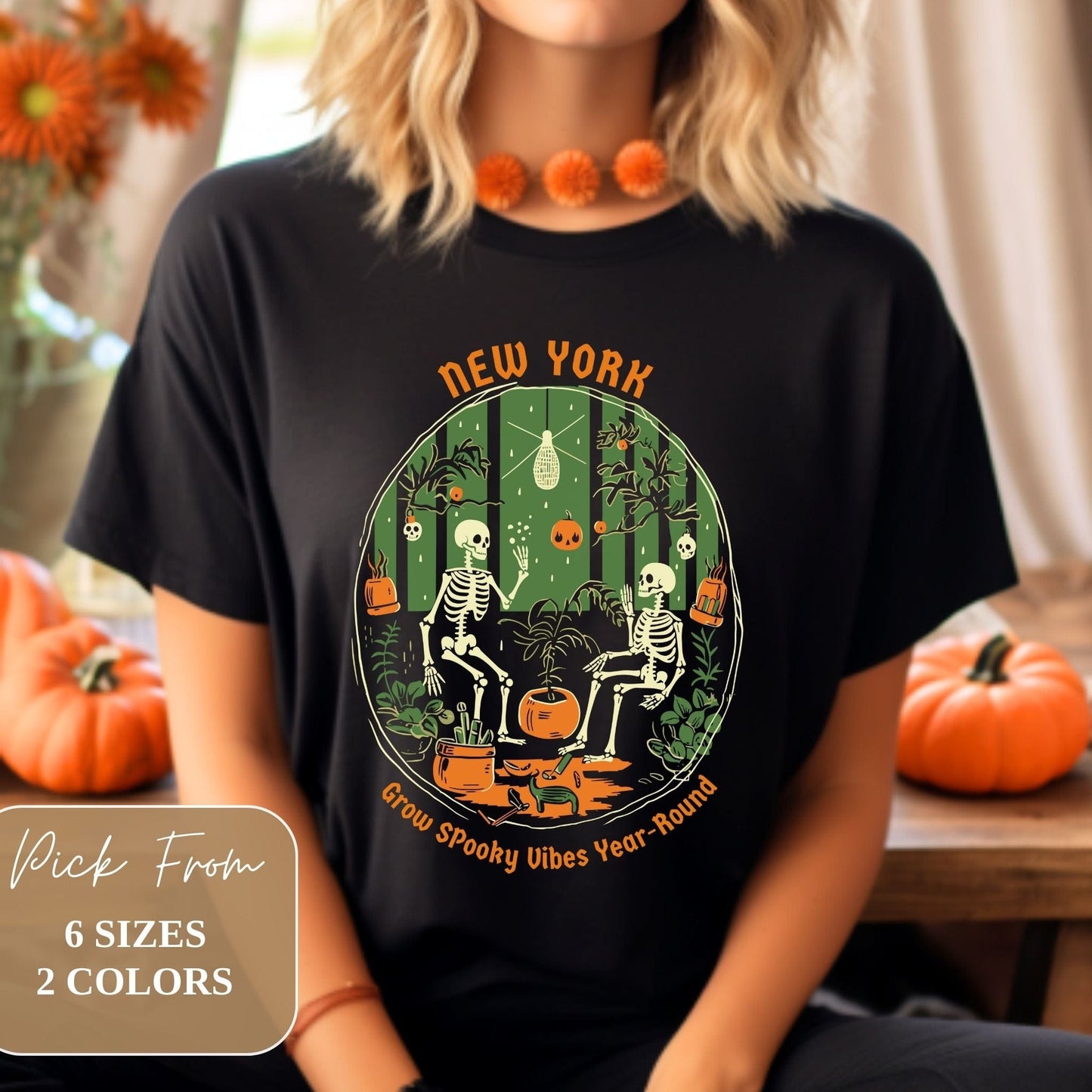 Female model wearing Trendy New York Halloweentown 2023 Skeleton Printed Youth Halloween Black Gildan G6400 Shirt