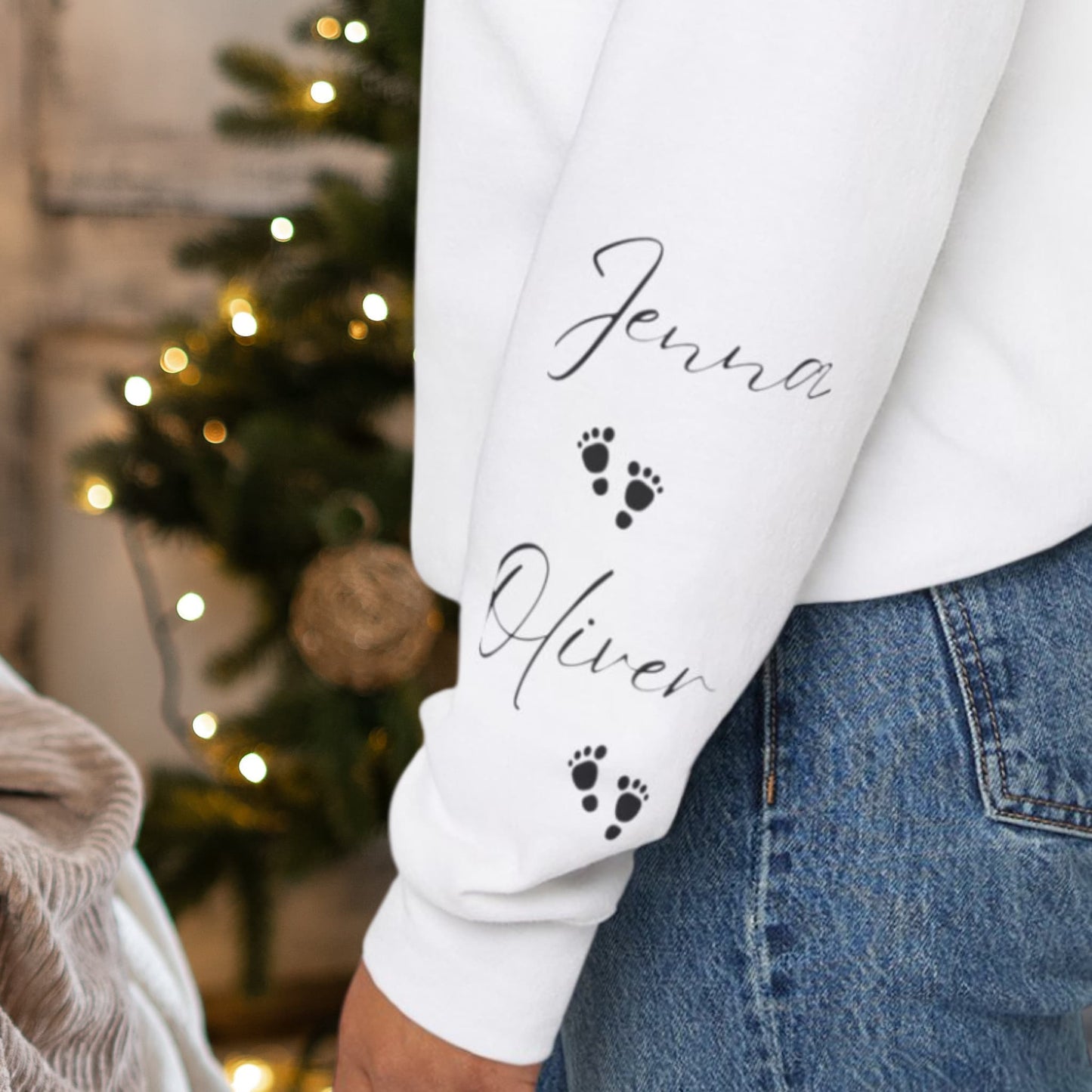 Close-up of the sleeve design on Alabama's Custom Mom Crewneck Sweatshirt, featuring personalized kids' names.
