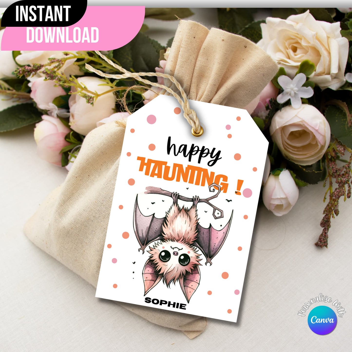 Bat-themed Halloween printable tag displayed on a gift bag with flowers on the side.