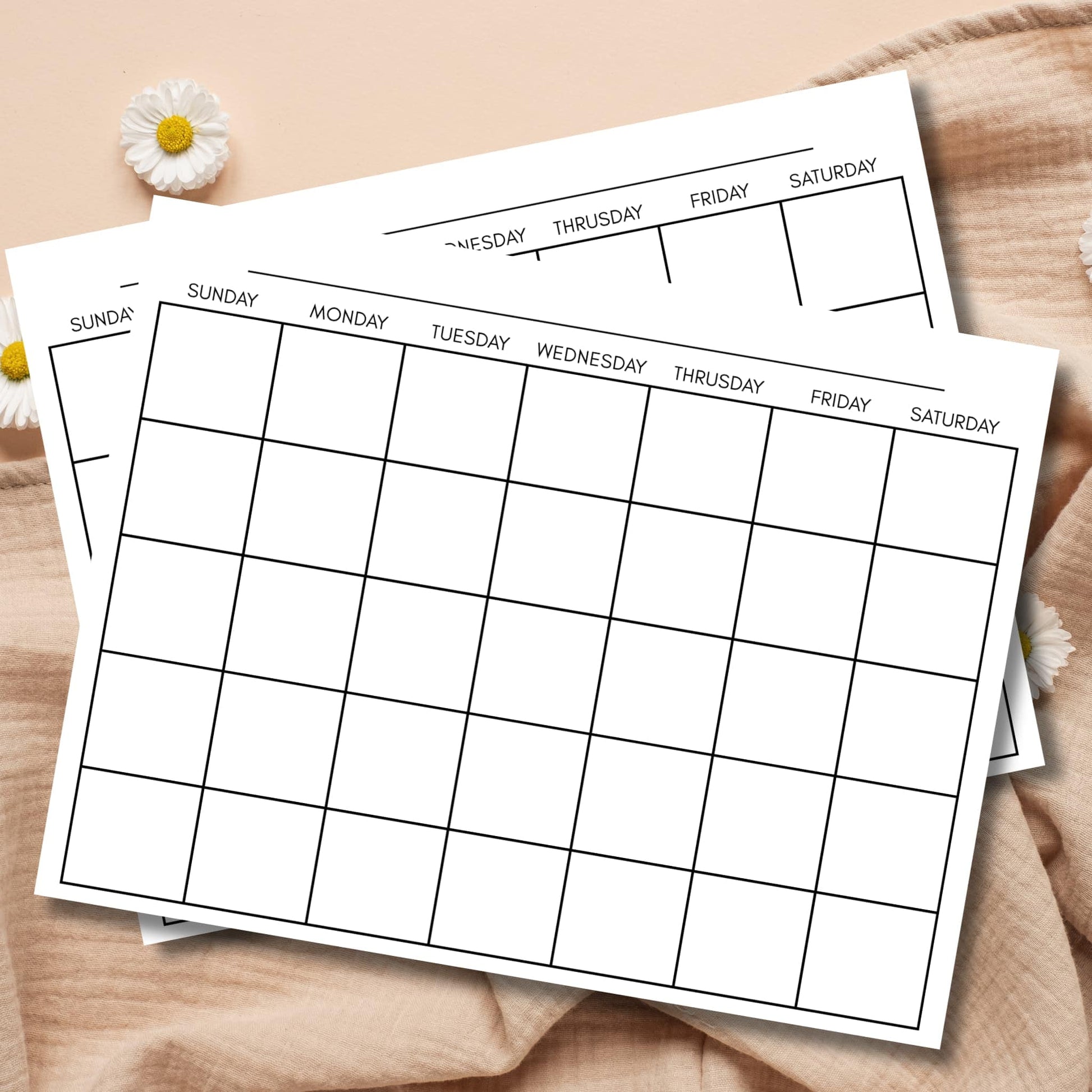 Blank printable monthly calendar template with white daisy flowers on beige linen background.