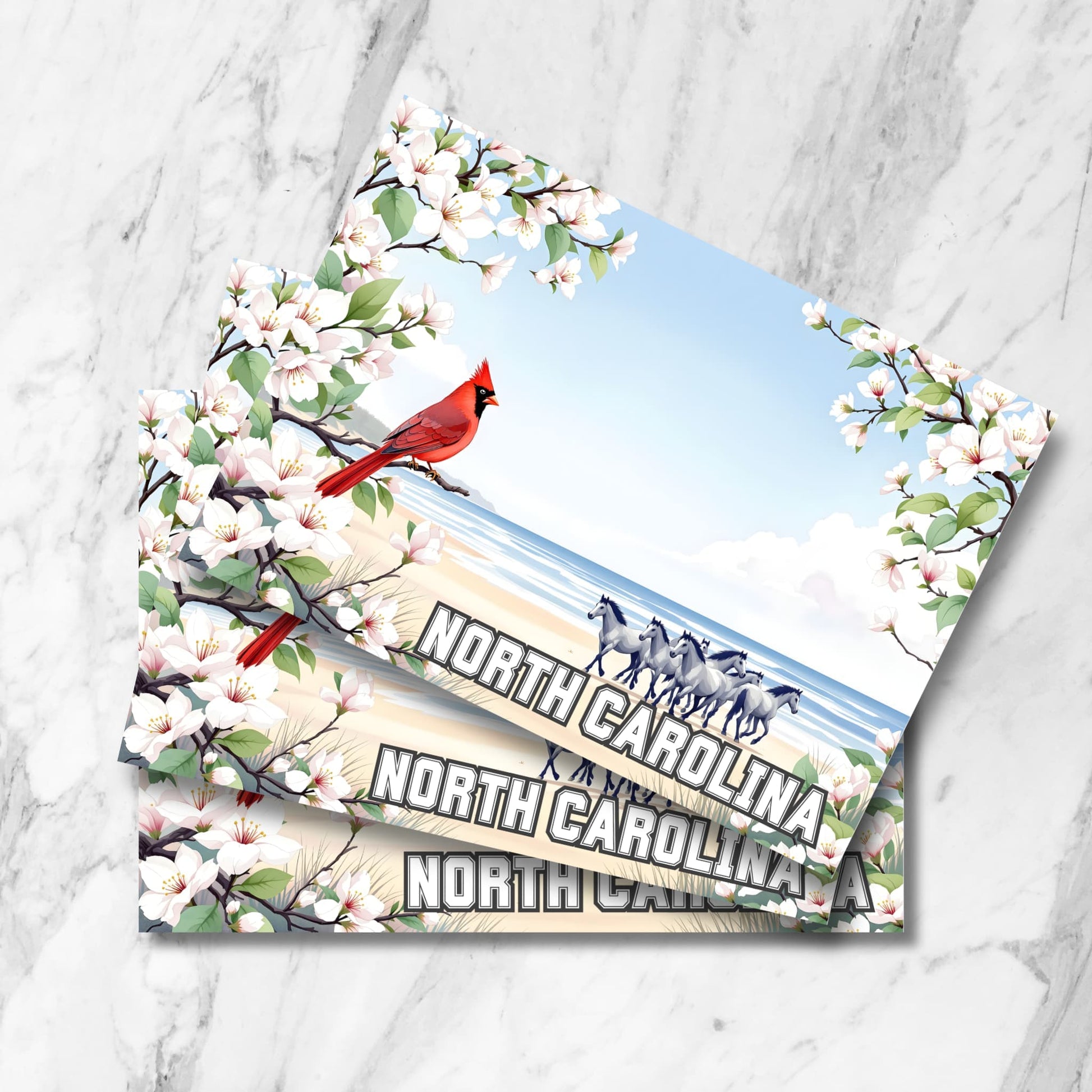 Digital postcard of red cardinal on North Carolina beach with blooming dogwoods and wild horses near shoreline