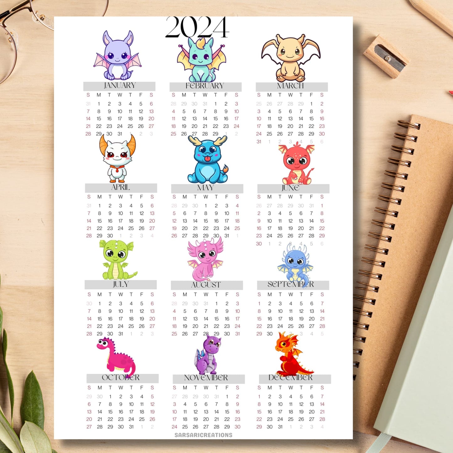 Dragon-themed 2024 calendar on light brown wooden desk with school supplies like notebook, pencil, sharpener.