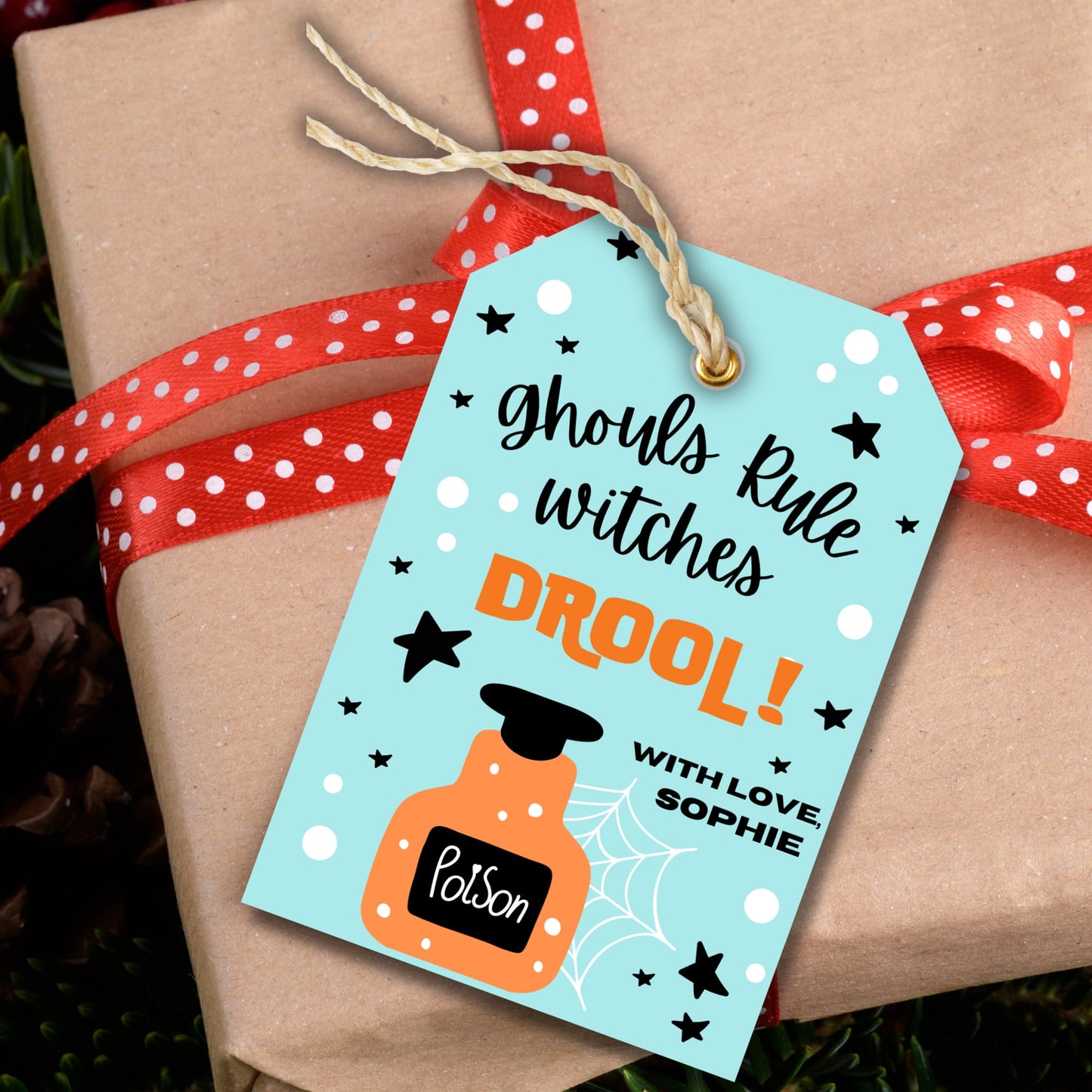 Halloween printable tag showcased on a brown gift box.