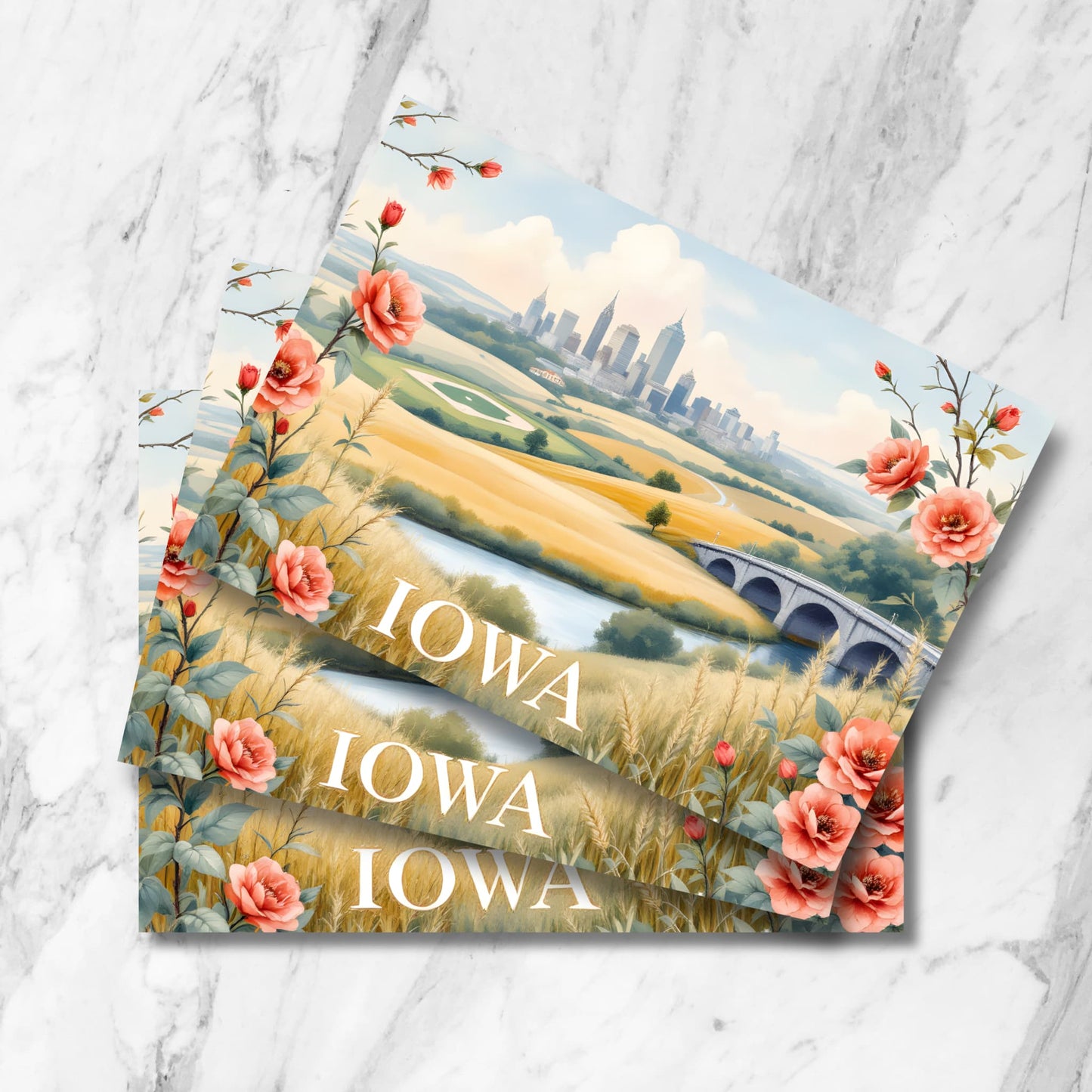 Romantic Iowa postcard featuring Des Moines skyline, historic bridge, and golf course framed with coral roses. Wheat fields and river valley create pastoral foreground beneath urban backdrop.