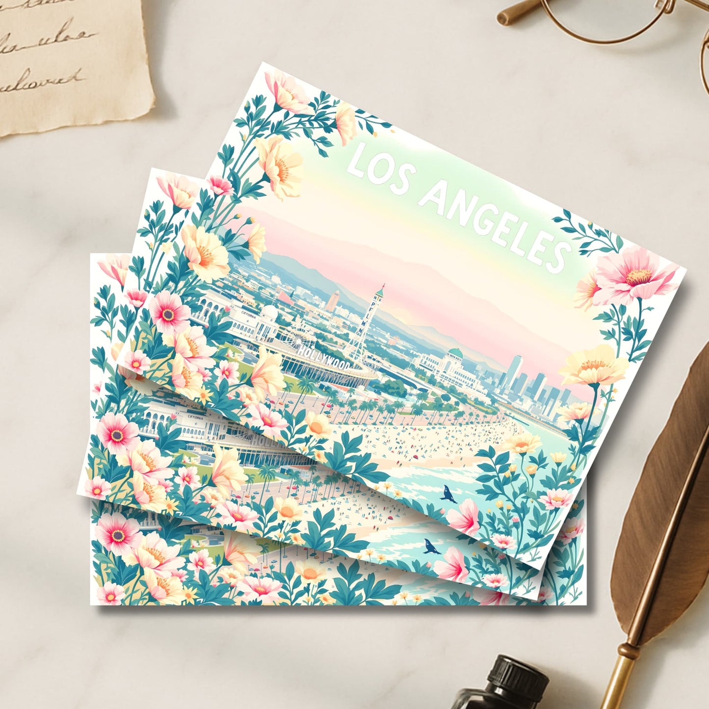 Los Angeles illustrated art prints with pink wildflower borders and beach cityscape in vintage styling.