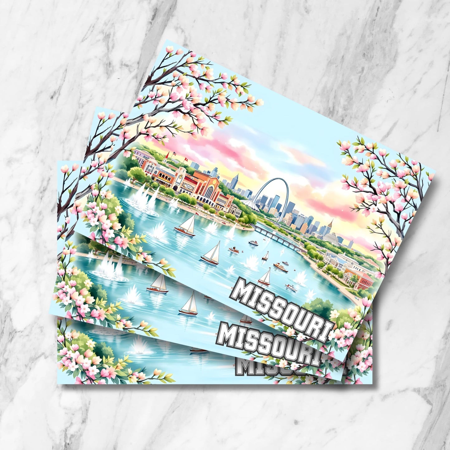 Missouri digital postcard featuring gateway arch skyline, historic buildings, pink blossoms, and boats sailing on the river.