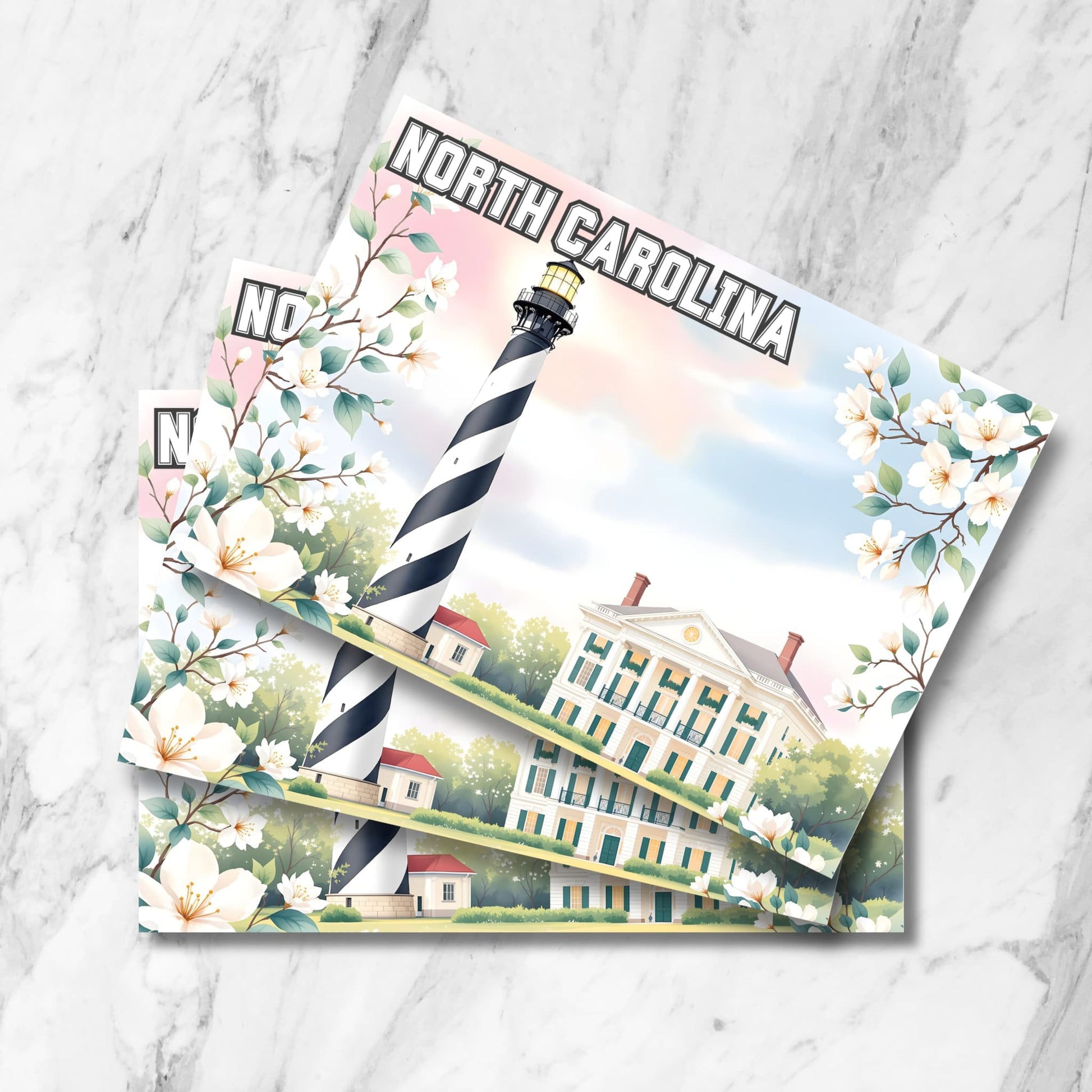 Charming North Carolina postcard featuring black-and-white lighthouse and Southern mansion with floral frame