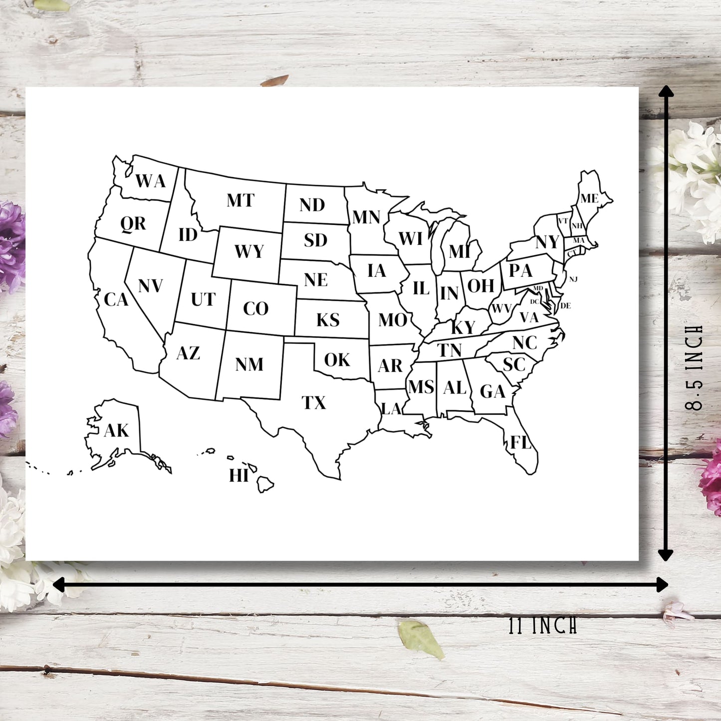 USA map showing 11x8.5 inch dimensions. Complete with state abbreviations, Alaska and Hawaii included on wooden background.