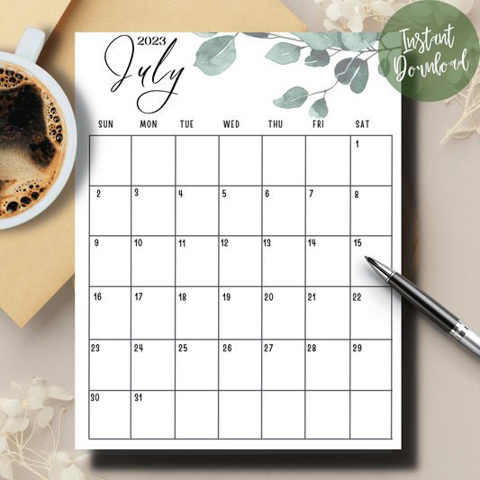 July minimalist calendar with leaf on it on a table with coffee 