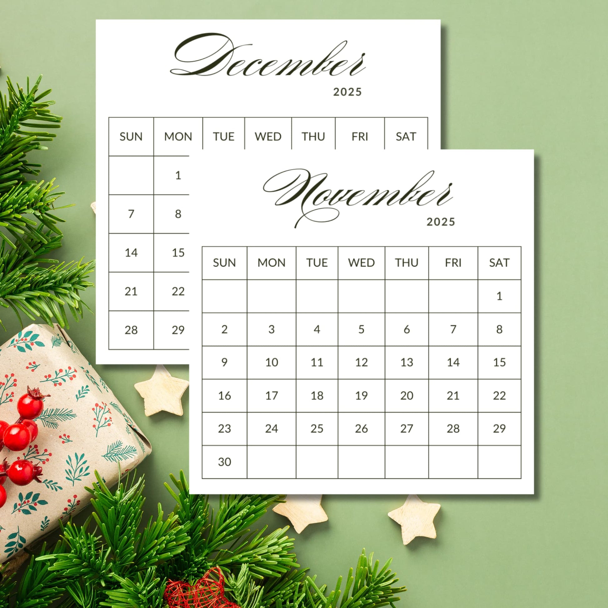 2025 minimalist calendar showing November and December months with elegant script typography on white background, decorated with Christmas pine branches, red berries, and wooden stars