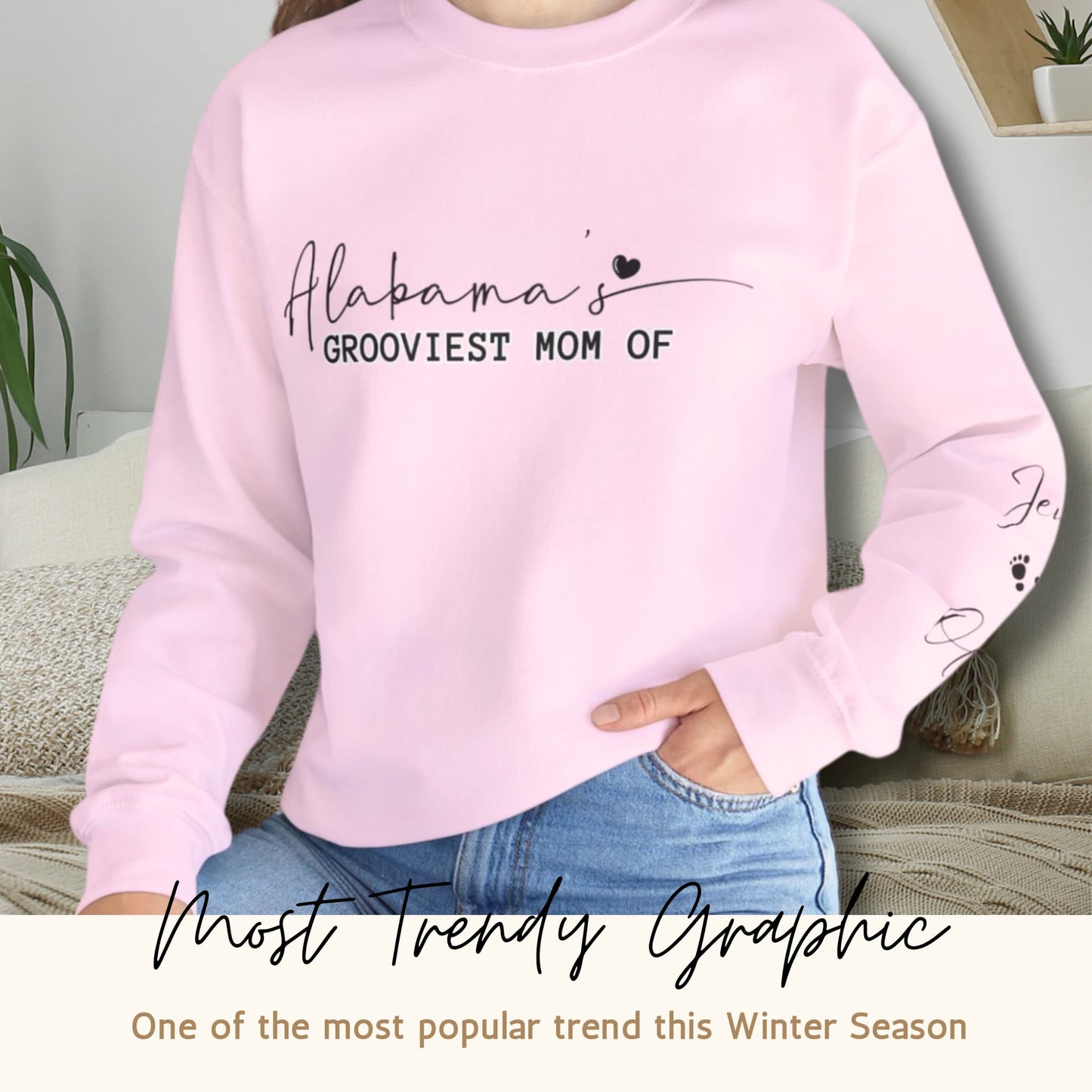 Lifestyle image of a woman wearing Alabama's Custom Mom Crewneck Sweatshirt with trendy graphic text, portraying a casual and stylish look.