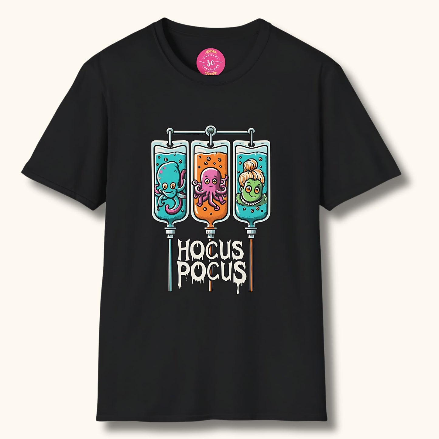 Black t-shirt with 'Hocus Pocus' design. Three IV bags feature playful octopus, squid, and mermaid characters. Sarsari Creations label visible.