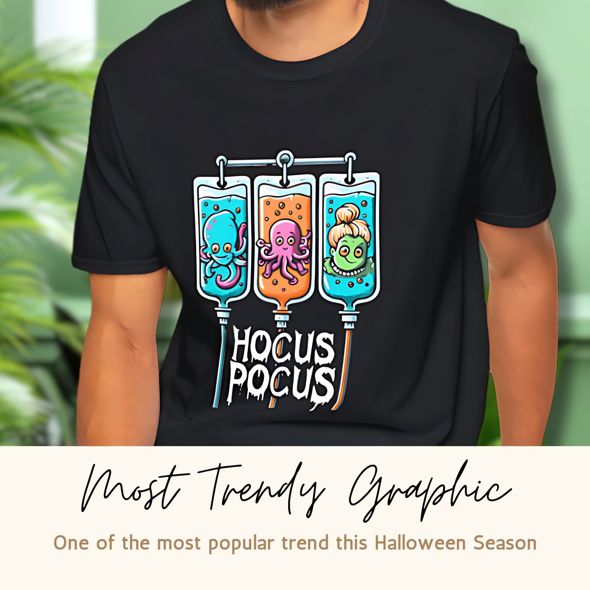 Black t-shirt with 'Hocus Pocus' design featuring three IV bags with sea creatures. Labeled 'Most Trendy Graphic' for Halloween season.