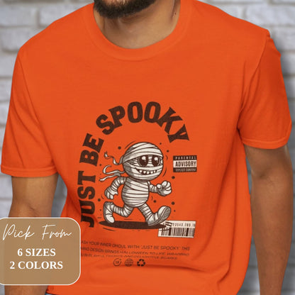 Just be Spooky Halloween Orange Color Graphic Vintage Tee on a Male Model