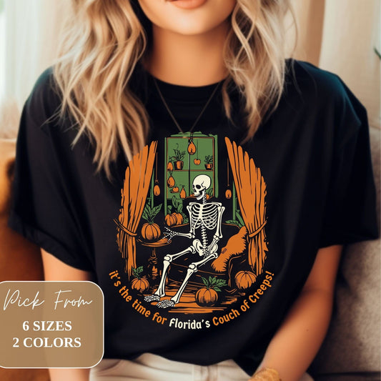 Female model wearing Florida Vintage Creepy 2023 Skeleton Halloween Black Gildan G6400 Shirt