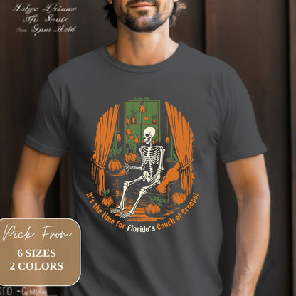 Male model showcasing Florida Vintage Creepy 2023 Skeleton Halloween Dark Grey Gildan G6400 Shirt