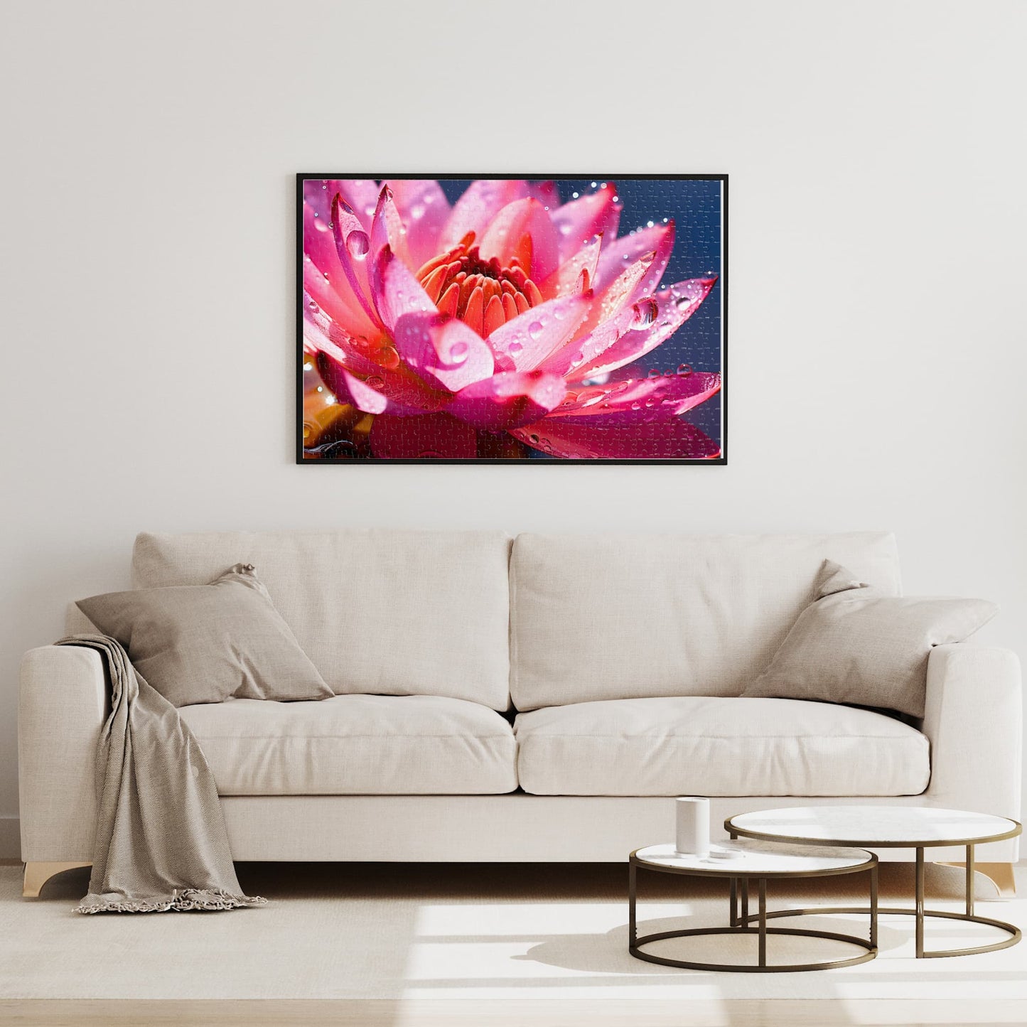 Elegantly framed 1000 piece jigsaw puzzle featuring a stunning pink lotus flower with water drops, acting as a vibrant living room wall decor piece.
