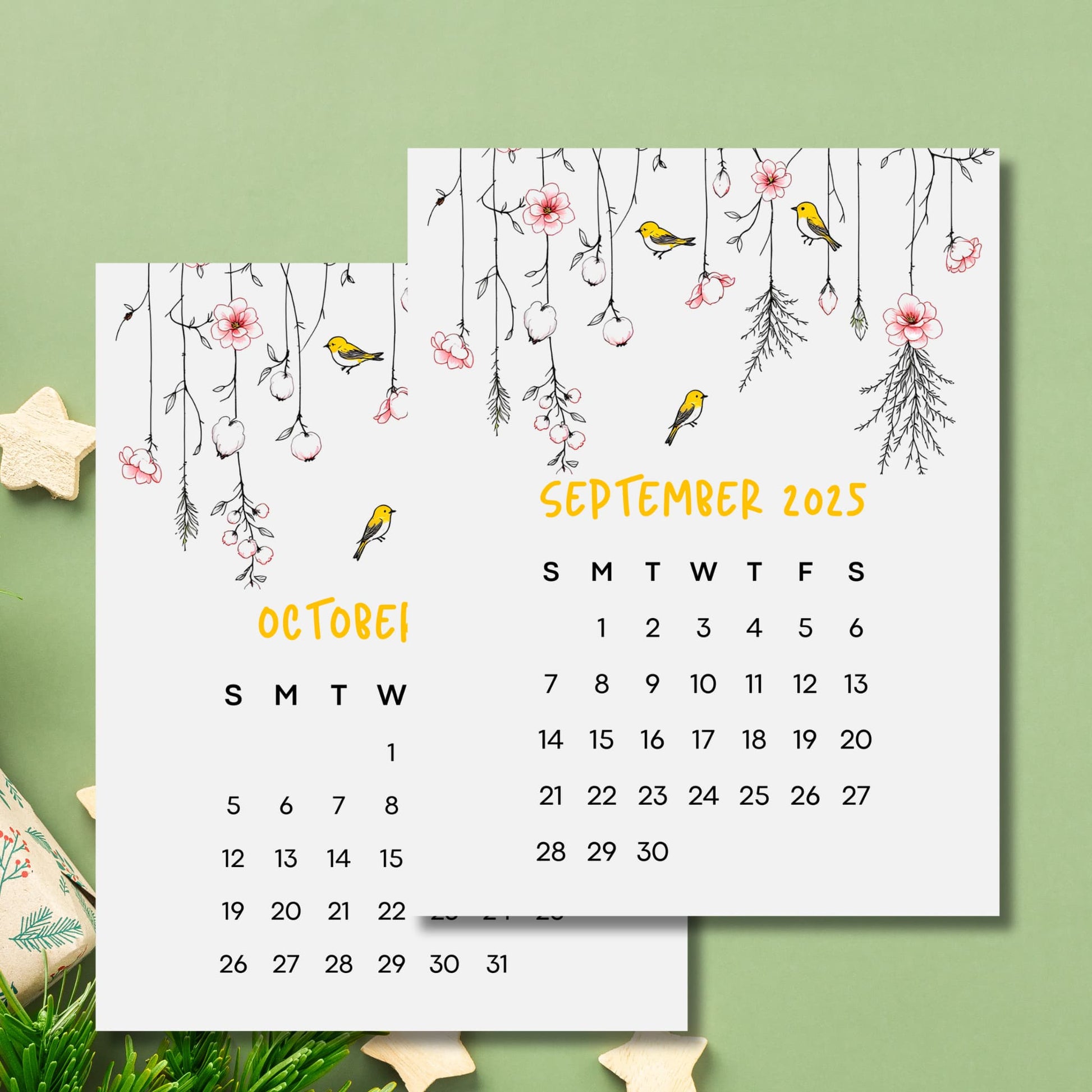 September and October 2025 calendar pages with yellow finch motif and delicate cherry blossom illustrations on green background with decorative elements