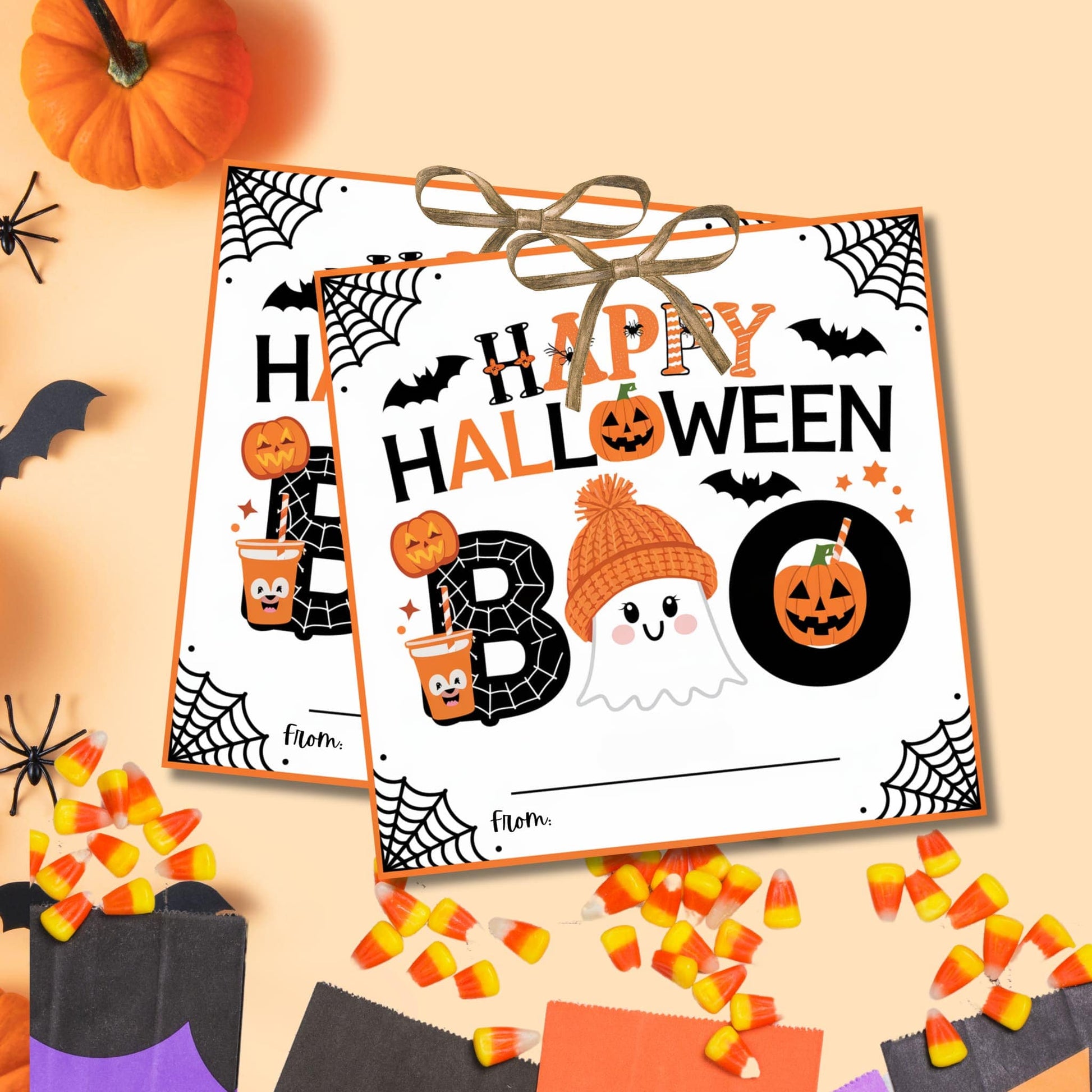 Halloween favor tags with pumpkin, spider, and candy corn decorations showcasing "Happy Halloween" design for party favors