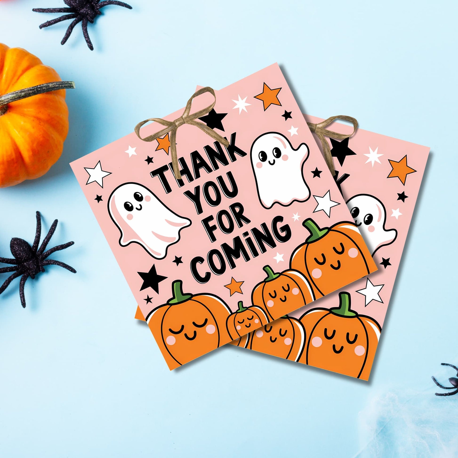 Two Halloween thank you tags with bow ties, ghosts, and pumpkins on blue background