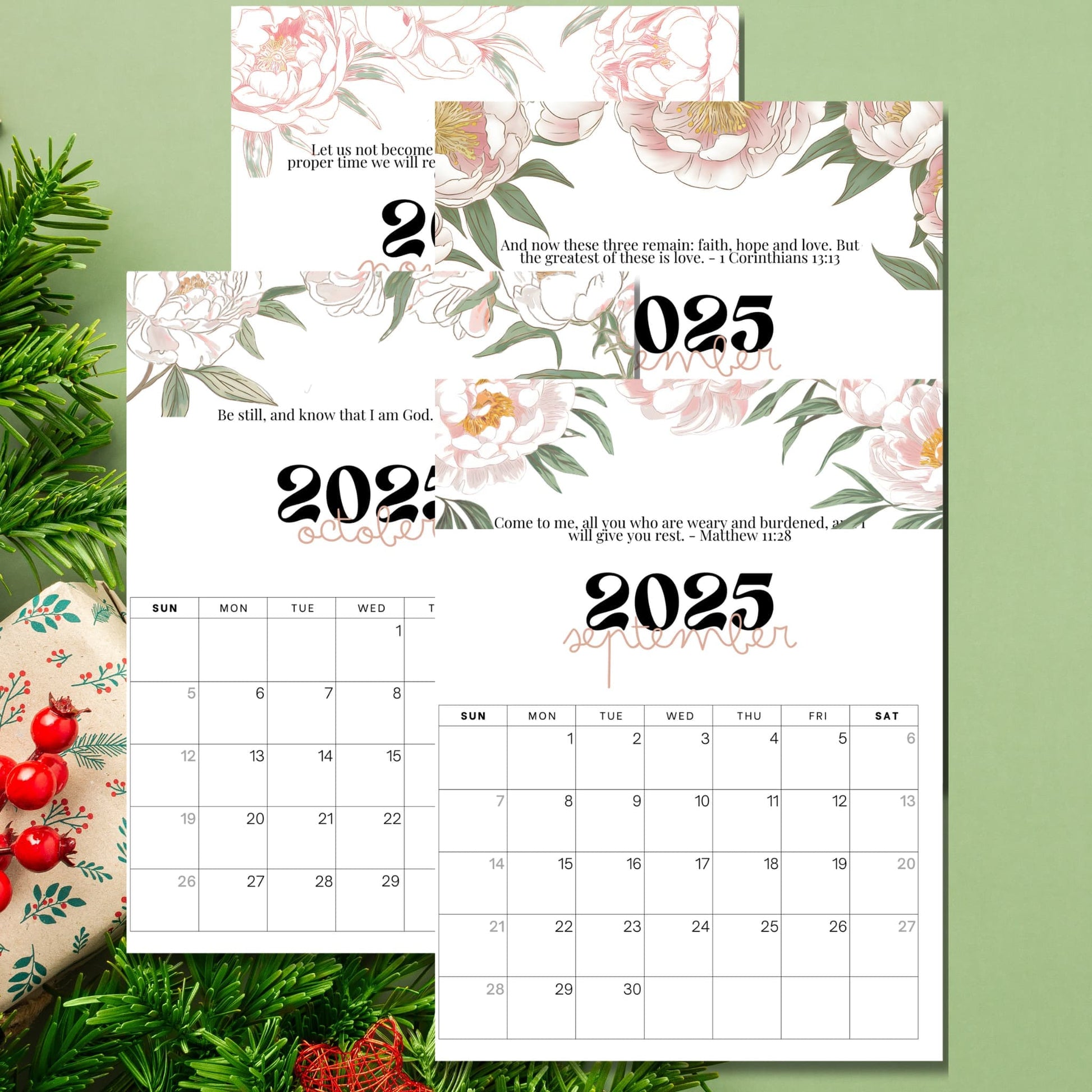 Fall and winter months of 2025 Bible verse calendar showing September through December, featuring inspirational scriptures from Corinthians and Matthew, adorned with soft pink peonies on festive green background