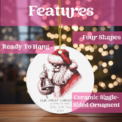  Customized Family Christmas Ornament elegantly displayed on a wooden table with twinkling lights in the background.