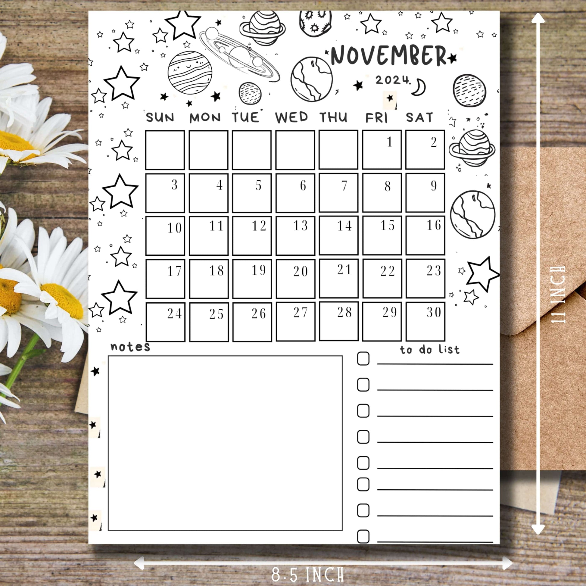 A4 size November calendar with measurement indicators, featuring space doodles and celestial bodies, decorated with daisies on rustic wood