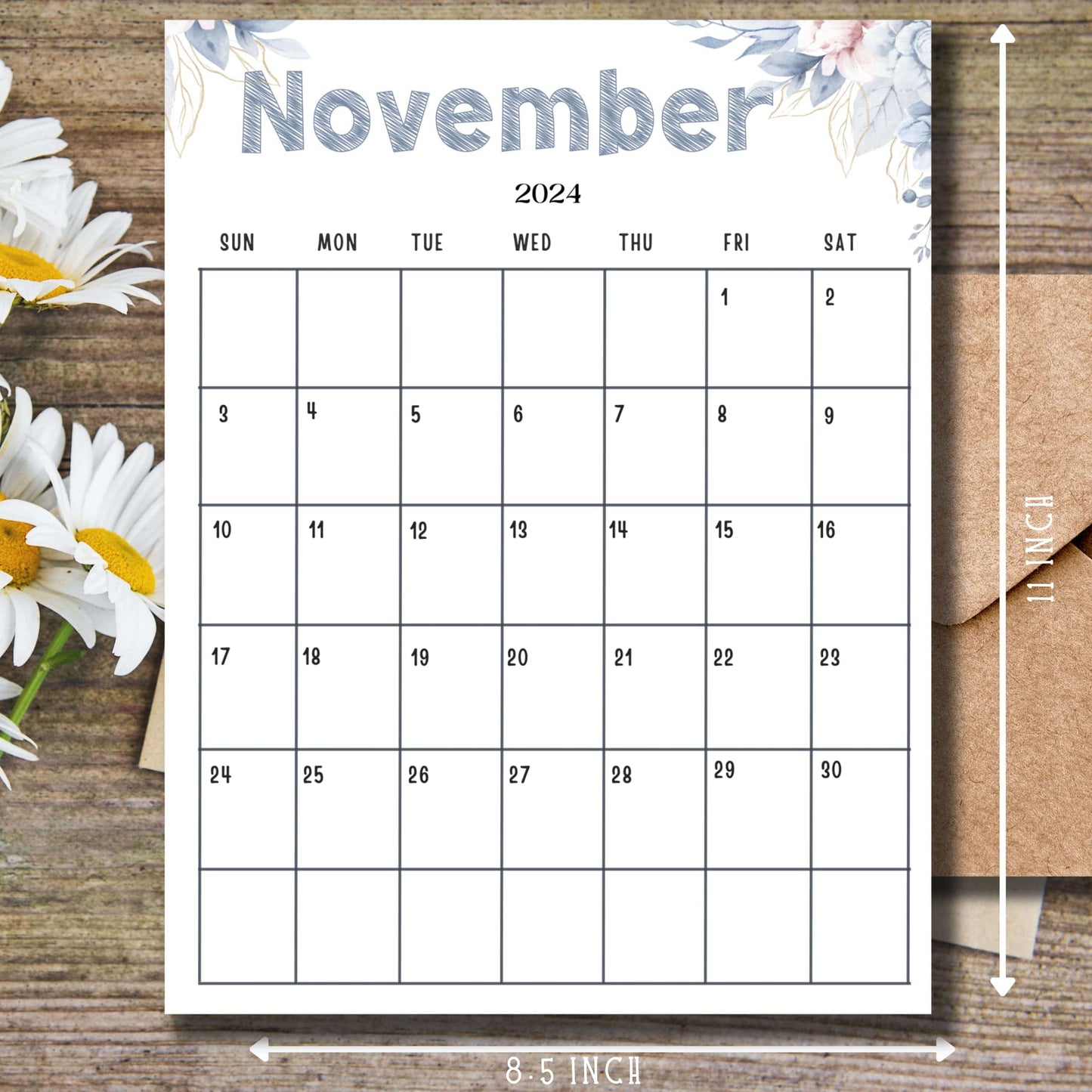 November calendar with measurement indicators, sketched title and watercolor florals, styled with fresh daisies on rustic wooden background