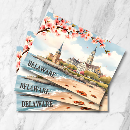 Stacked preview of Delaware beach postcards featuring cherry blossoms, historic coastal architecture, church spires, and red crabs on sandy shore in vintage watercolor style