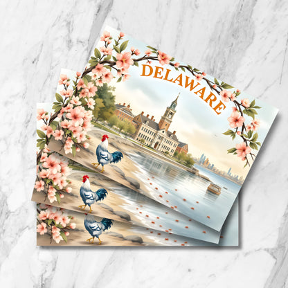 Stacked preview of Delaware waterfront postcards featuring colonial architecture, cherry blossoms frame, blue rooster, and red crabs with historic clock tower and city skyline in vintage watercolor style