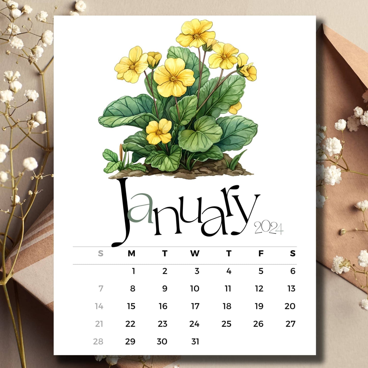 Early Primrose floral January 2024 full year calendar on a table with envelope and small white flowers.