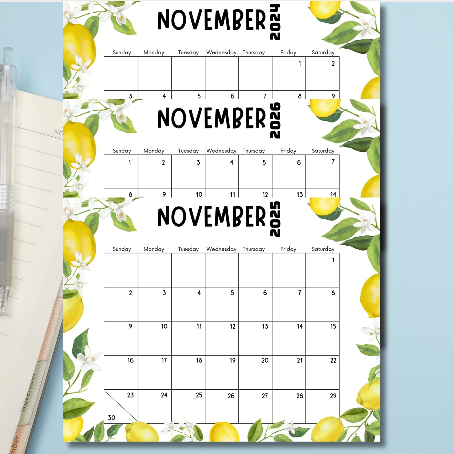 Three November calendars for 2024, 2025, and 2026 with lemon theme. Stacked layout showing full month views bordered by yellow lemons, white flowers, and green leaves.