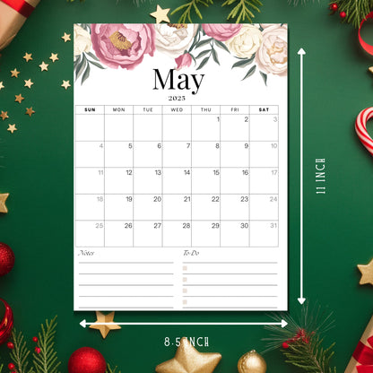 May 2025 calendar page showing 8.5x11 inch dimensions, featuring watercolor pink roses and sage green foliage header, with notes and to-do list sections on holiday-themed background