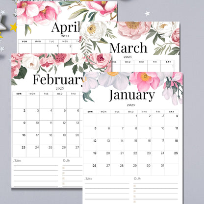 Spring months of 2025 floral calendar showing January through April, adorned with delicate pink and white roses, green foliage accents, displayed with star decorations on silver background