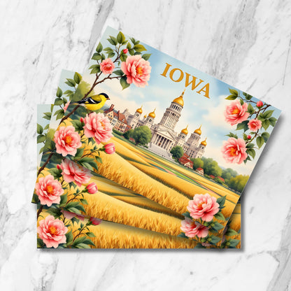 Vintage-style Iowa postcard featuring picturesque golf course with rolling hills, historic bridge, and Des Moines skyline at sunset. Pink wild roses frame the scenic landscape, showcasing the blend of urban and recreational landmarks.