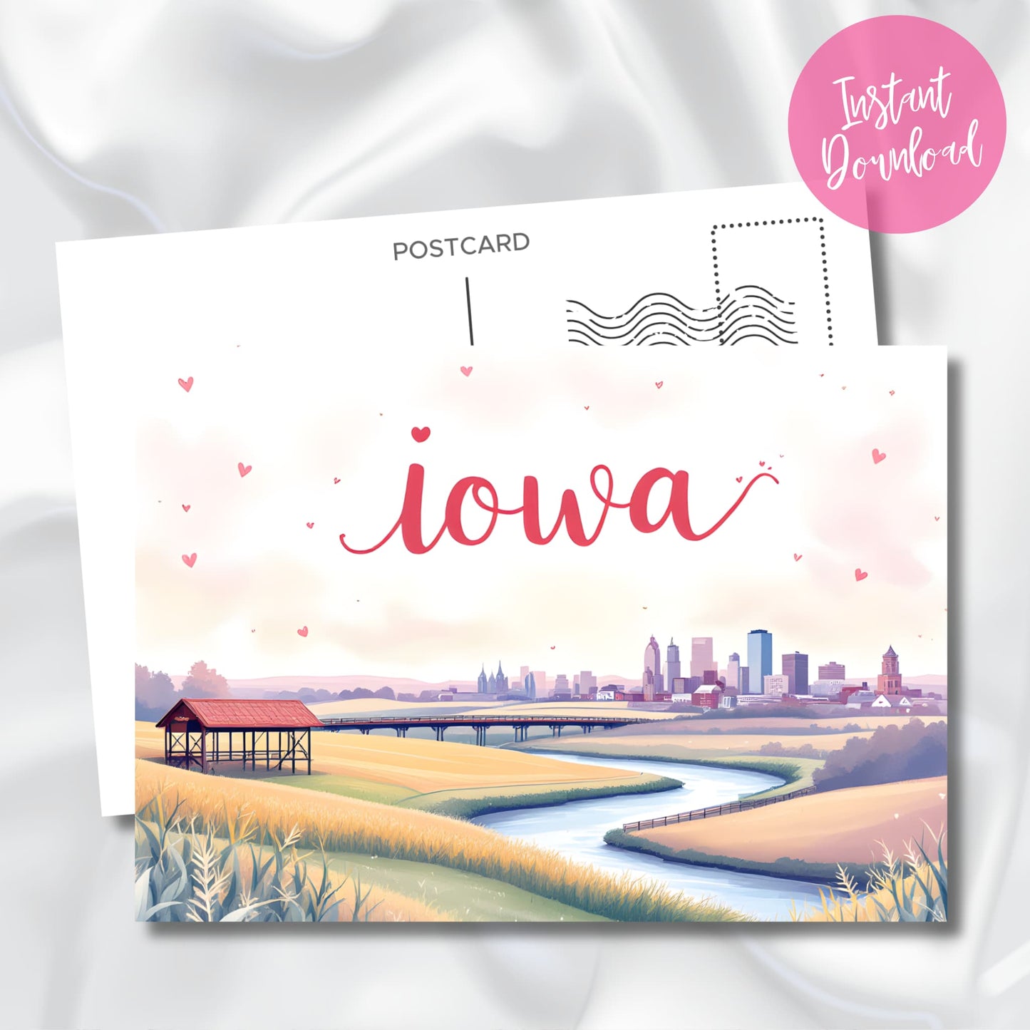 Digital download Iowa souvenir postcard highlighting urban and rural landscape with city skyline, winding river, and agricultural scenery. Features whimsical heart decorations and instant download badge.