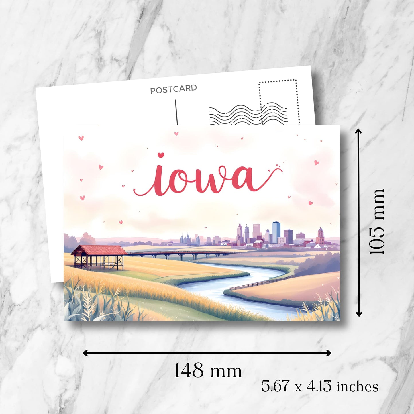 Iowa landscape postcard with size specifications (148x105mm/5.67x4.13 inches). Shows Des Moines cityscape, river valley, and countryside shelter, with standard postcard template layout.