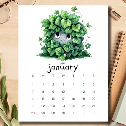 Ivy Intrigue January 2024 calendar on light brown wooden desk with school supplies like notebook, pencil, sharpener.