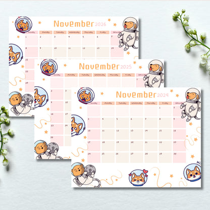 Flat lay of November calendars 2024-2026 featuring adorable space puppies and moon illustrations, styled with white lily of the valley flowers on light background.