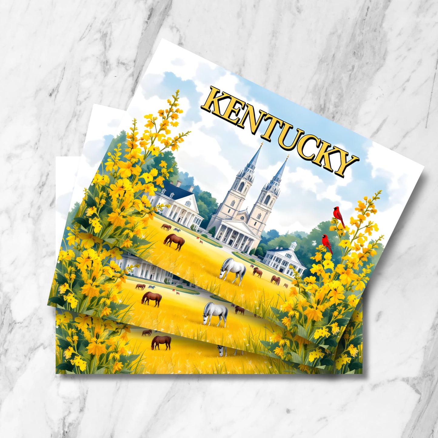 Stack of Kentucky postcards featuring Gothic cathedral, grazing horses in golden meadow framed by blooming goldenrod and red cardinals on marble background