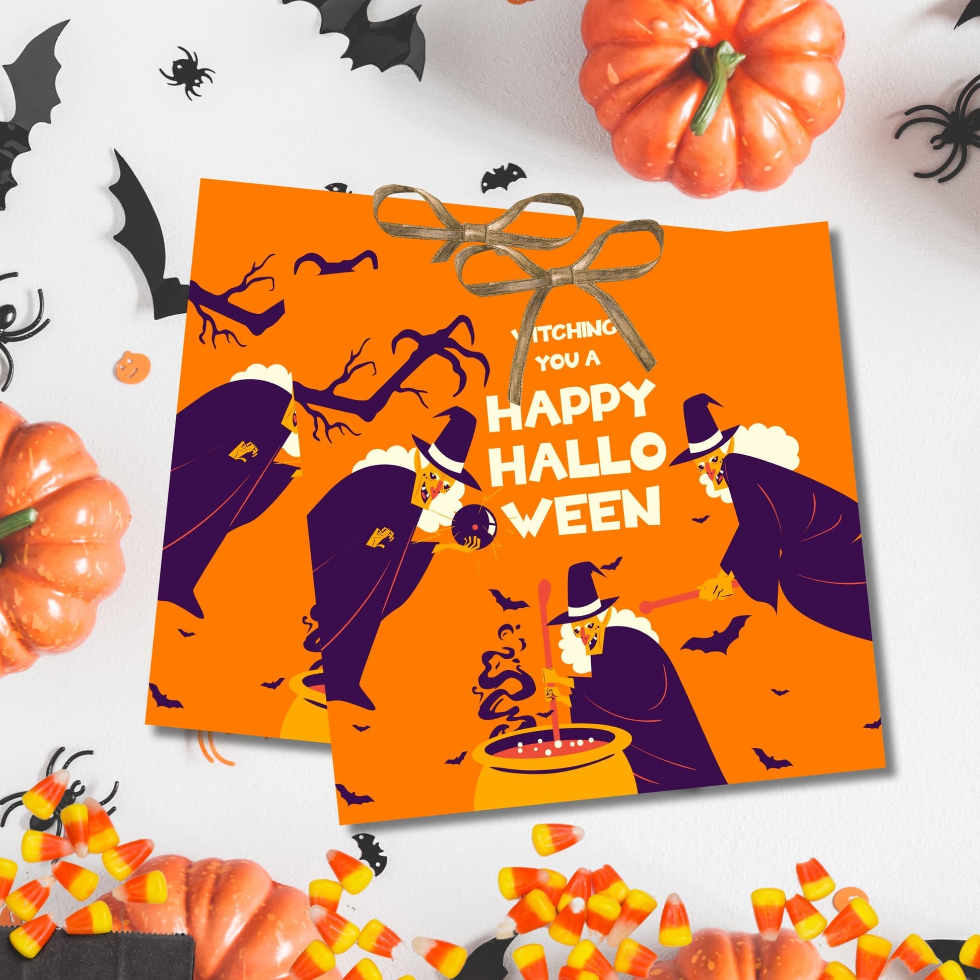 Halloween favor tags with whimsical witch illustration and cauldron scene, decorated with gold bows against white background, surrounded by pumpkins and candy corn accents.