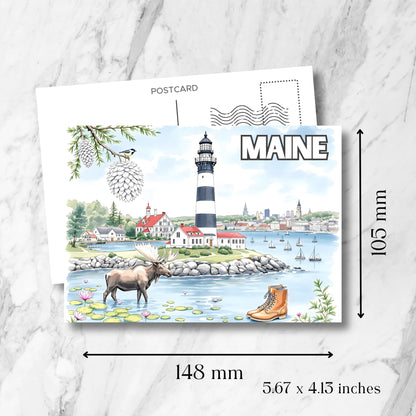 Maine lighthouse postcard showing dimensions of 148x105mm. Features striped lighthouse, wading moose, water lilies and New England coastal scene.