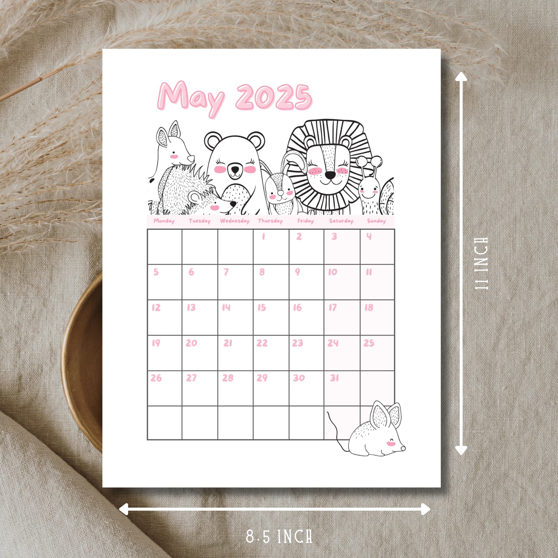 May 2025 calendar featuring line art bear, lion and deer illustrations. 8.5x11 inch dimensions with Monday-start grid and pink numbering on natural linen background.