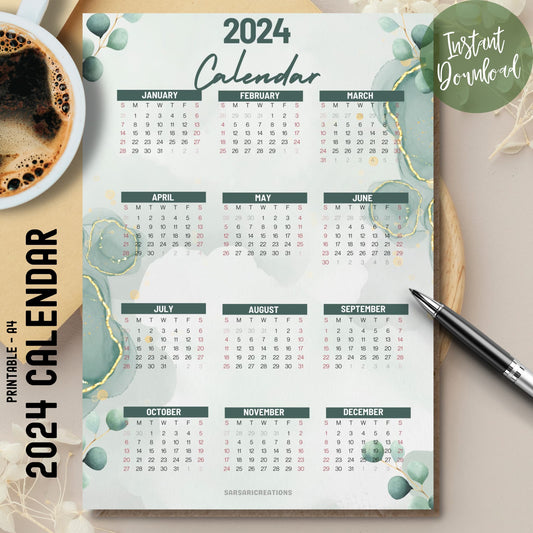 2024 full year calendar with modern aesthetic on brown desk, coffee cup on left, pen on right.