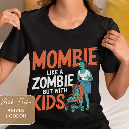 Black t-shirt with text 'MOMBIE LIKE A ZOMBIE BUT WITH KIDS' in orange and white. Features cartoon zombie mom pushing stroller. Modeled on person holding shirt edges. Overlay indicates 9 sizes available in 1 color.